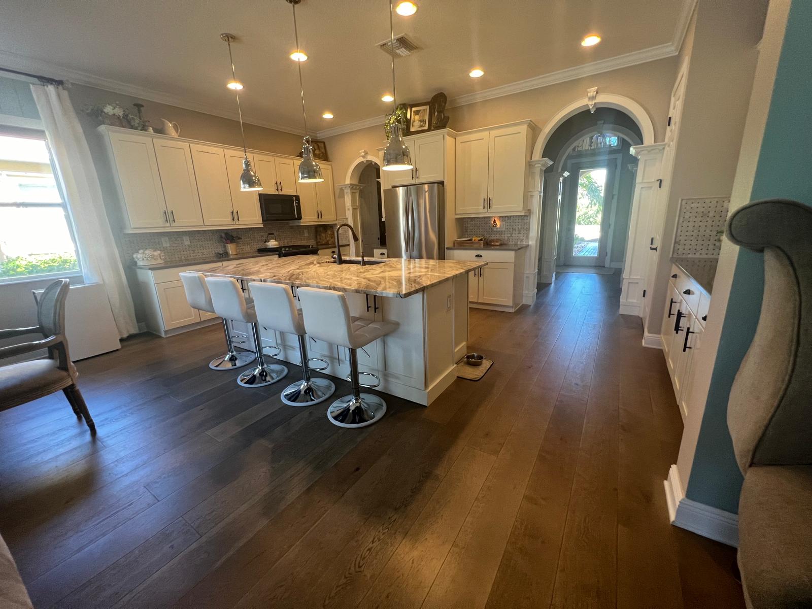 Open Concept Kitchen · Hardwood Floors